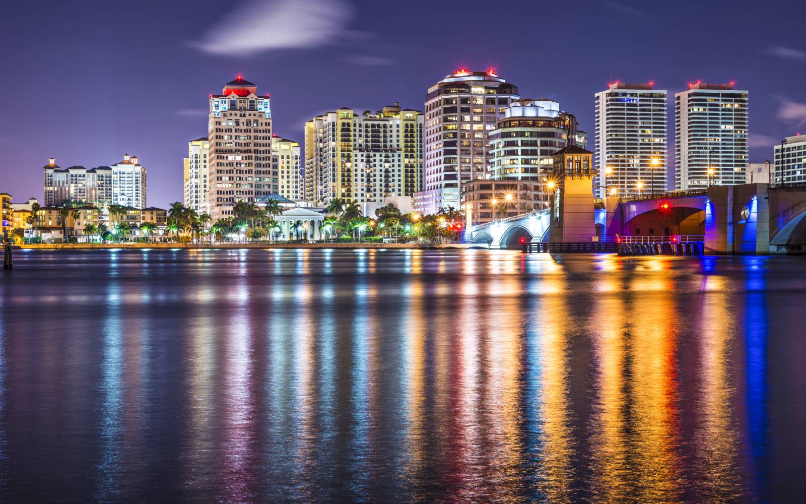 City skyline at night reflected on the water